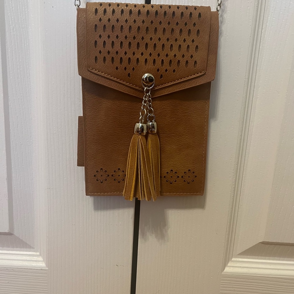 Elegant Tan Crossbody Bag with Tassel Accents